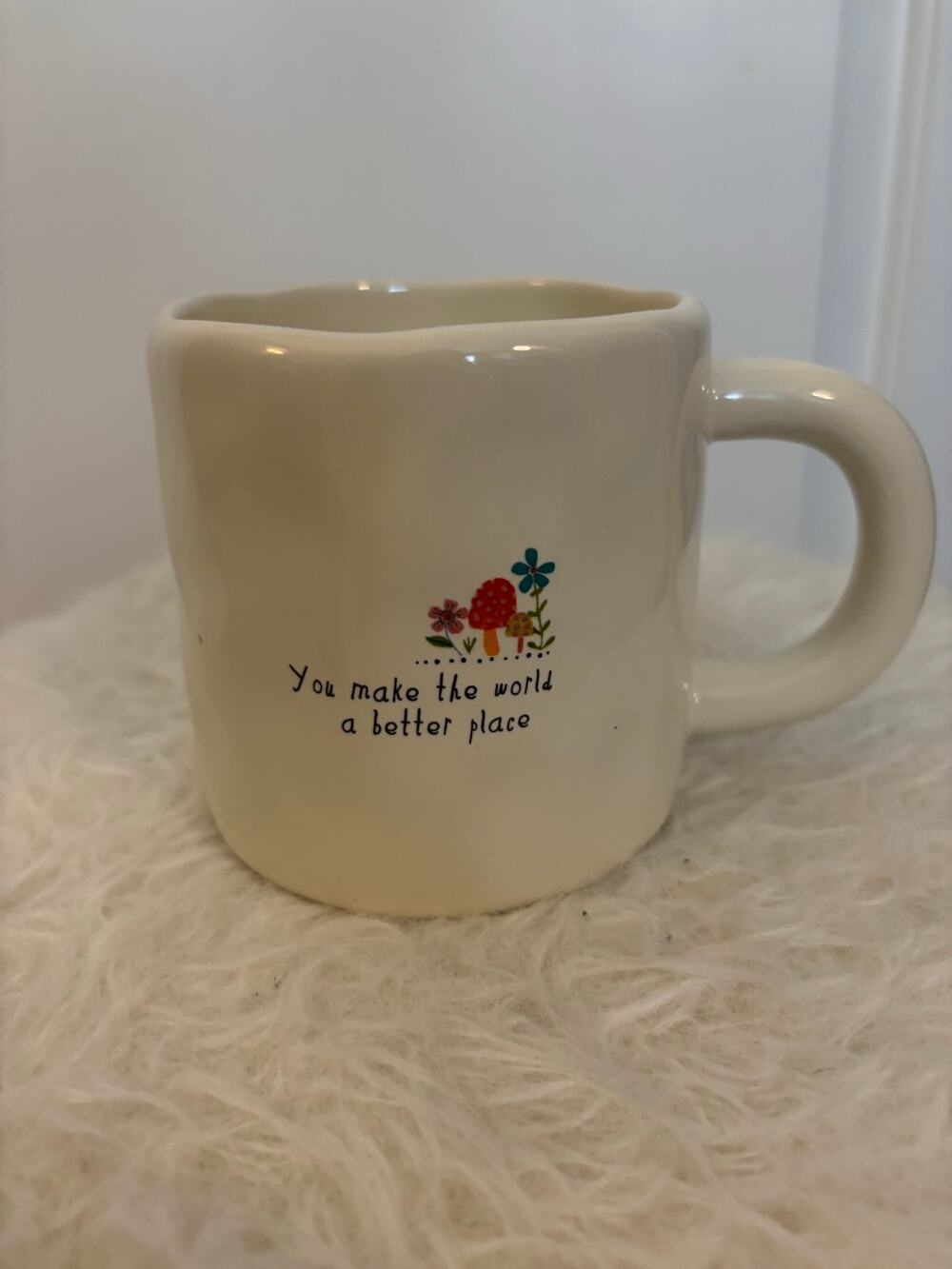 Natural Life brand ceramic mug with  "You make the world a better place"